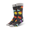Pair of crew socks with a 90s-inspired geometric print.  Colors include teal, orange, yellow, purple, and grey on a dark grey background.