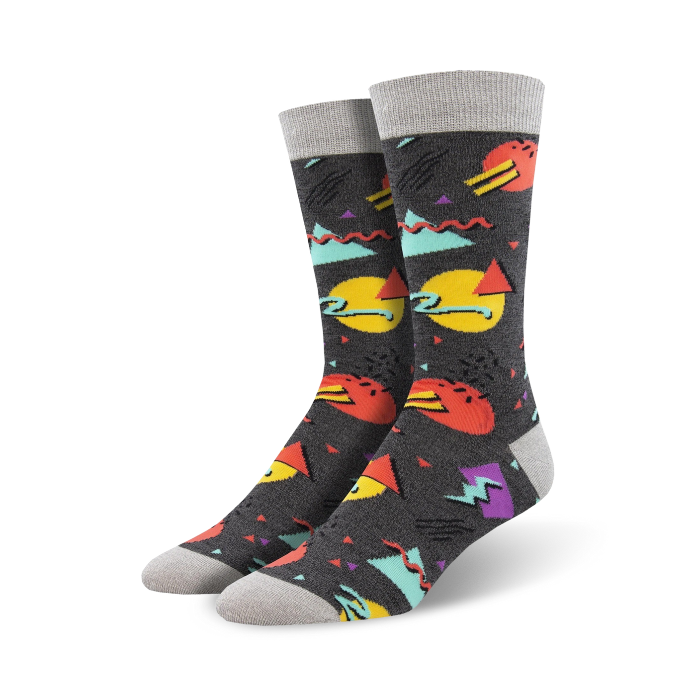 Pair of crew socks with a 90s-inspired geometric print.  Colors include teal, orange, yellow, purple, and grey on a dark grey background.