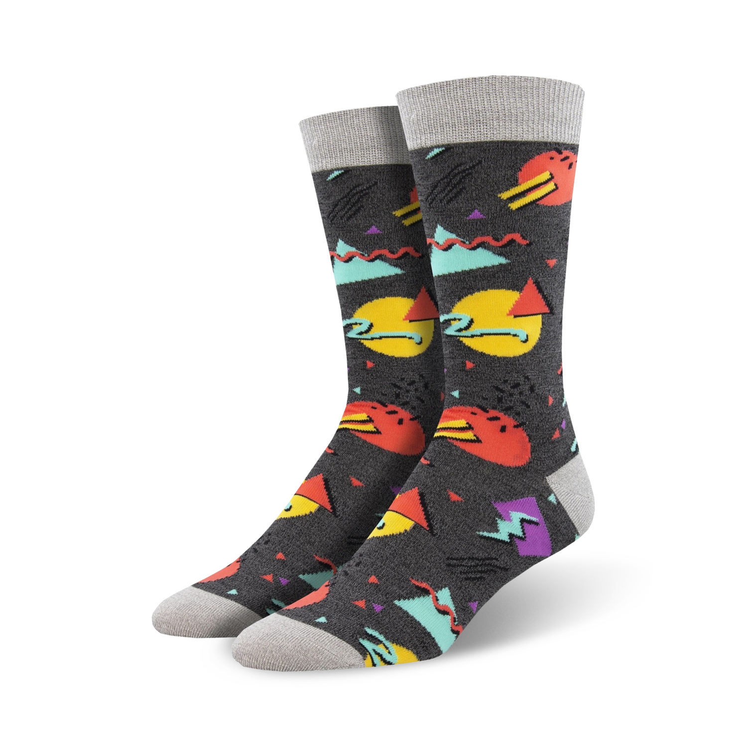 Pair of crew socks with a 90s-inspired geometric print.  Colors include teal, orange, yellow, purple, and grey on a dark grey background.