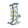 Pair of crew socks with a sunny-side-up egg pattern. Light blue background, white eggs with yellow yolks. Blue cuffs.