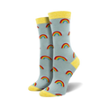 Pair of women's crew socks in light blue with colorful rainbow patterns. Yellow accents at the top of the socks.