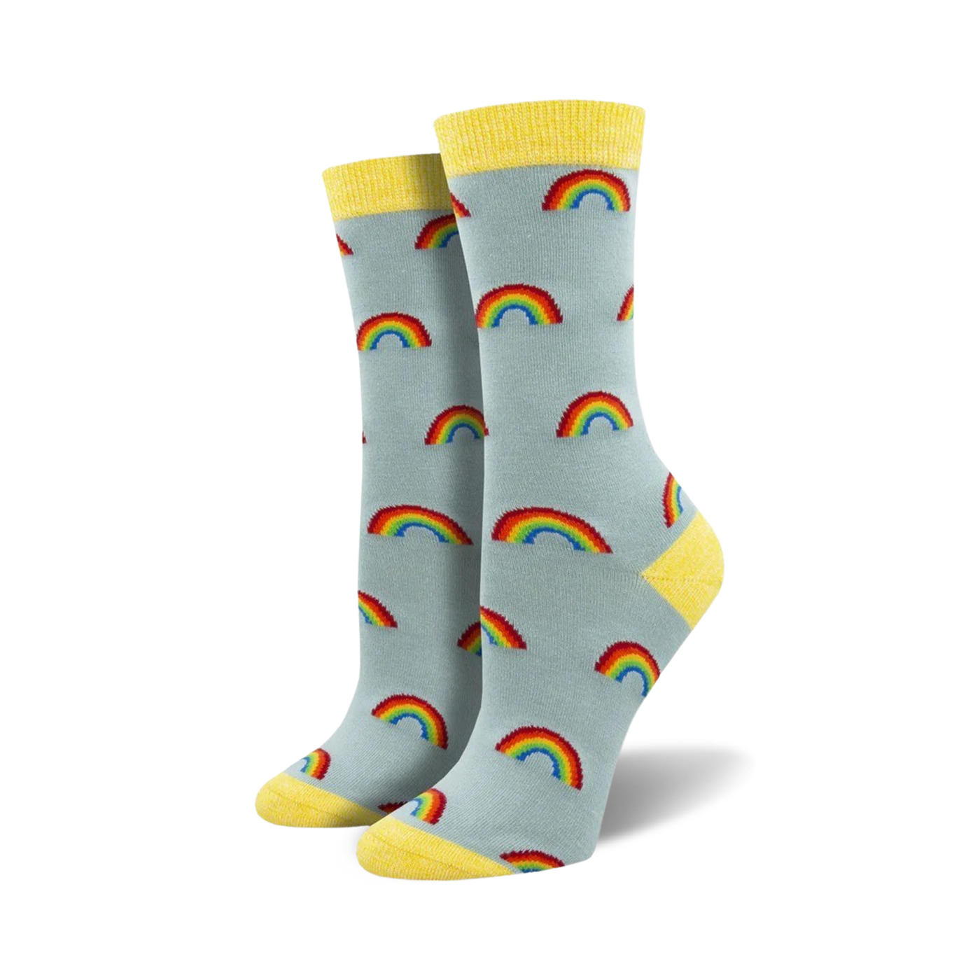 Pair of women's crew socks in light blue with colorful rainbow patterns. Yellow accents at the top of the socks.
