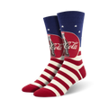 Pair of crew socks in red, white, and blue.  American flag stripes and Coca-Cola bottle graphics.