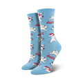 A pair of women's crew socks in light blue. The socks are covered in a pattern of polar bears wearing red scarves, penguins, and Coca-Cola logos.