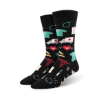 Pair of black crew socks with colorful medical icons: ambulances, hearts, bandages, stethoscopes, and more.  A fun, quirky design.
