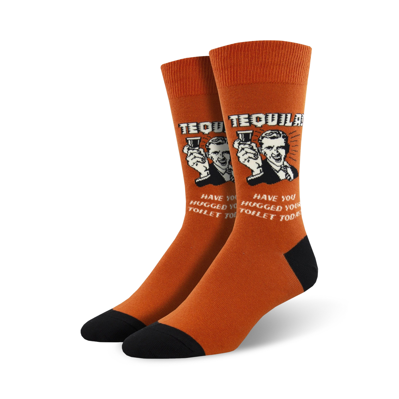 A pair of orange crew socks with a retro-style graphic of a man holding tequila shots and the text, 'Have you hugged your toilet today?'