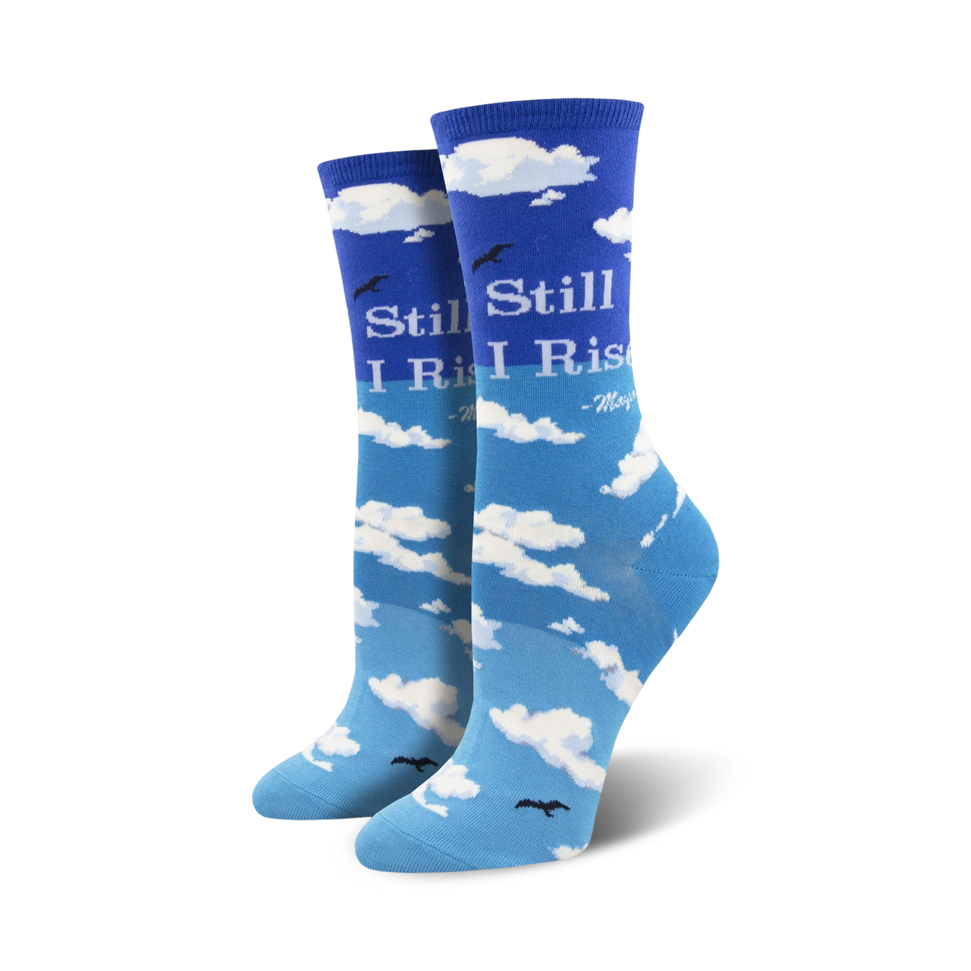 Pair of crew socks in shades of blue, featuring a sky and clouds design with Maya Angelou's 'Still I Rise' quote.