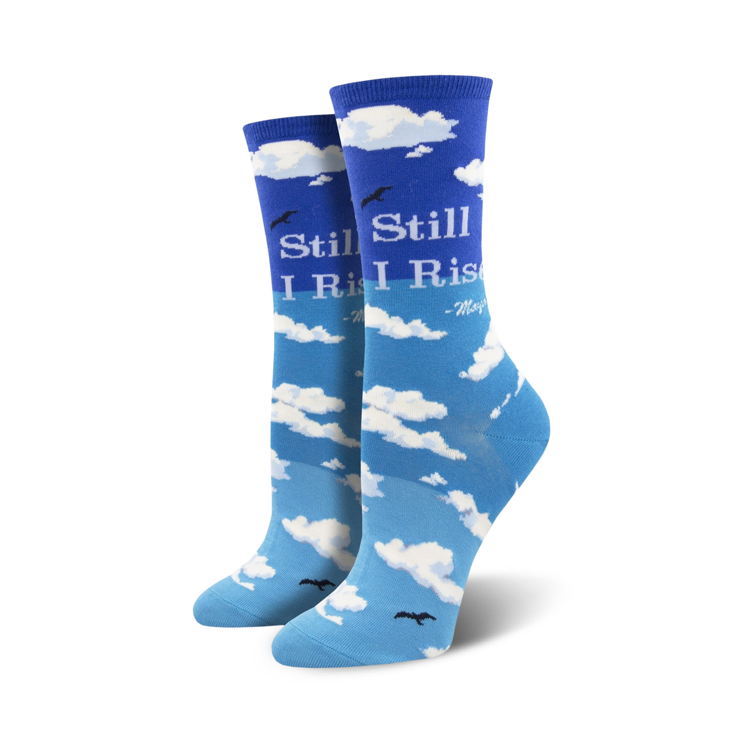 Pair of crew socks in shades of blue, featuring a sky and clouds design with Maya Angelou's 'Still I Rise' quote.