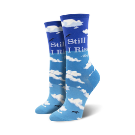 maya angelou still i rise crew socks: blue socks with white clouds, black birds, and "still i rise" lettering.  