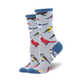 Lifestyle shot showing the socks on a person's feet, showcasing the light blue version of the bird socks.