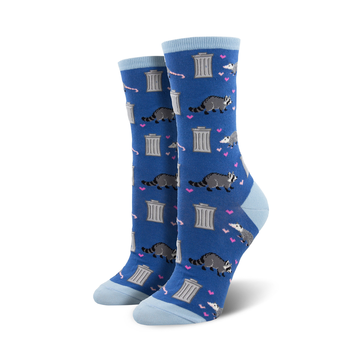 Lifestyle photo: Person wearing blue 'Trashy Love' socks with black combat boots and sitting on a skateboard.