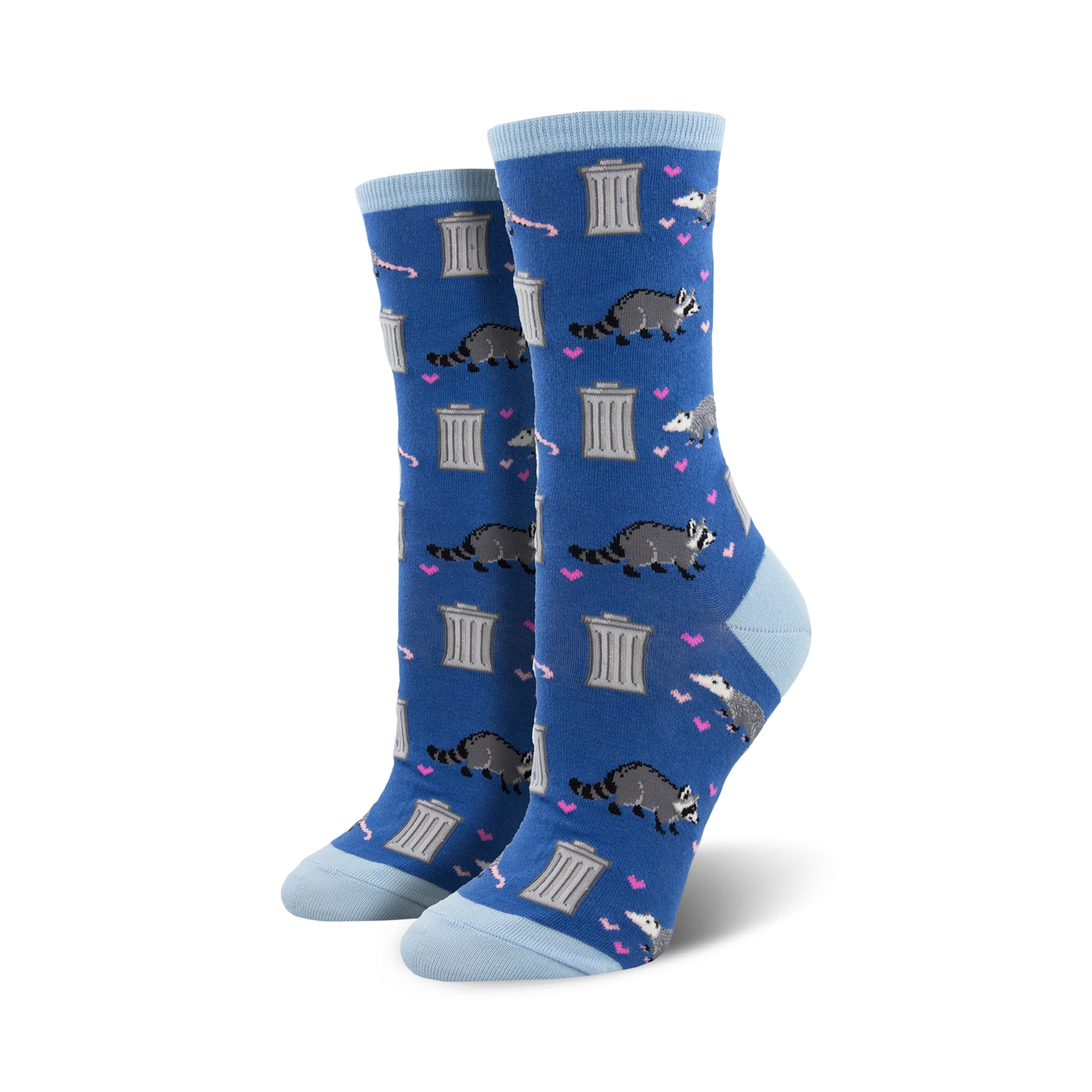 Lifestyle photo: Person wearing blue 'Trashy Love' socks with black combat boots and sitting on a skateboard.