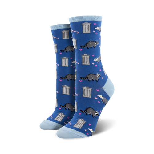 Lifestyle photo: Person wearing blue 'Trashy Love' socks with black combat boots and sitting on a skateboard.