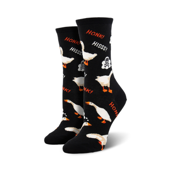   **black crew socks with white geese pattern, orange feet and beaks, skull and crossbones, and "honk!" and "hiss!" speech bubbles.**  
