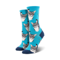 Lifestyle shot showing the teal 'Boop' socks on a person's feet, highlighting their fit and color.