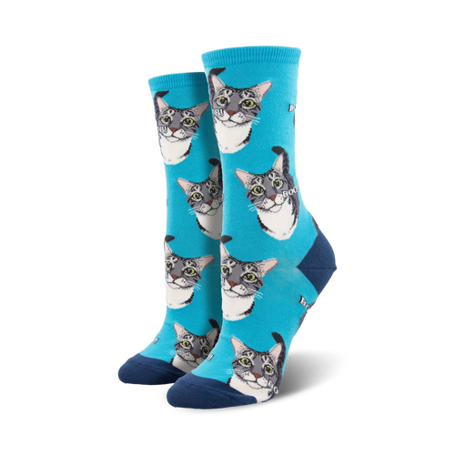 Lifestyle shot showing the teal 'Boop' socks on a person's feet, highlighting their fit and color.