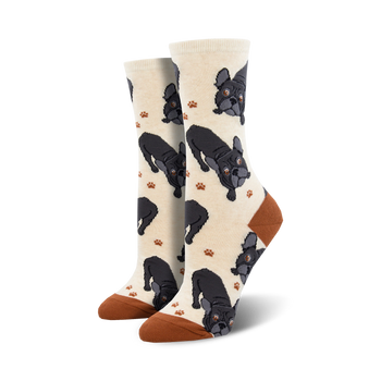 cream crew socks with cartoon french bulldogs, brown paw prints, brown toe and heel, and cream cuff.  
