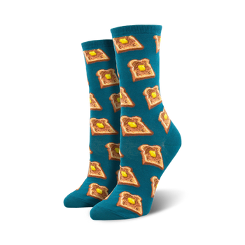 blue crew socks with slices of buttered toast with bite marks pattern. women's socks.  