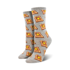 Close-up view of a pair of grey crew socks with a repeating pattern of illustrated slices of buttered toast.