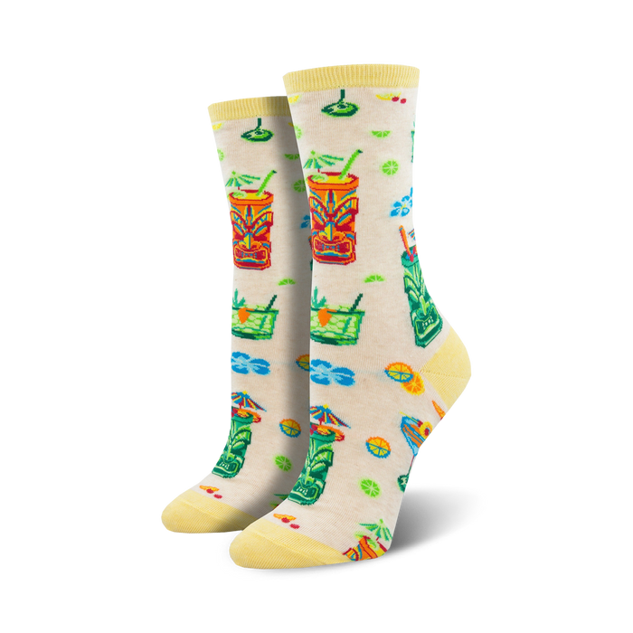  white crew socks with colorful tiki drinks surrounded by tropical leaves and flowers.  