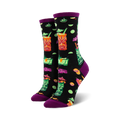 Close-up of black crew socks featuring the same tiki drink design, but on a black background. Purple cuff detail.