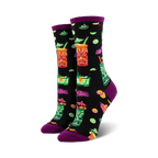 Close-up of black crew socks featuring the same tiki drink design, but on a black background. Purple cuff detail.