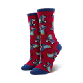 Pair of women's crew socks. Red background with blue roller skates.  Blue and white cuffs.