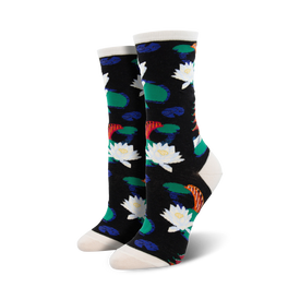 black crew socks with white, green, blue, orange, and yellow watercolor botanical lily pad and fish pattern.  