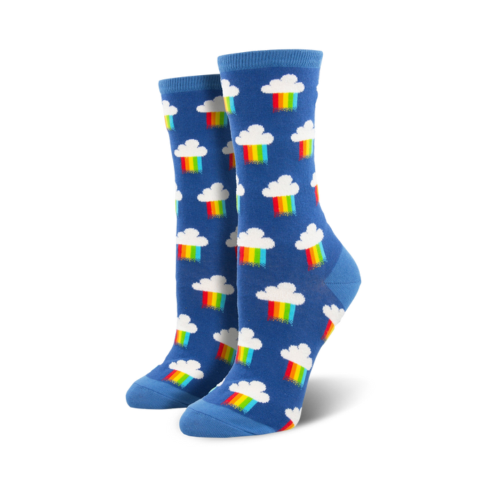 blue crew socks with cartoonish white clouds and rainbow pattern.    }}