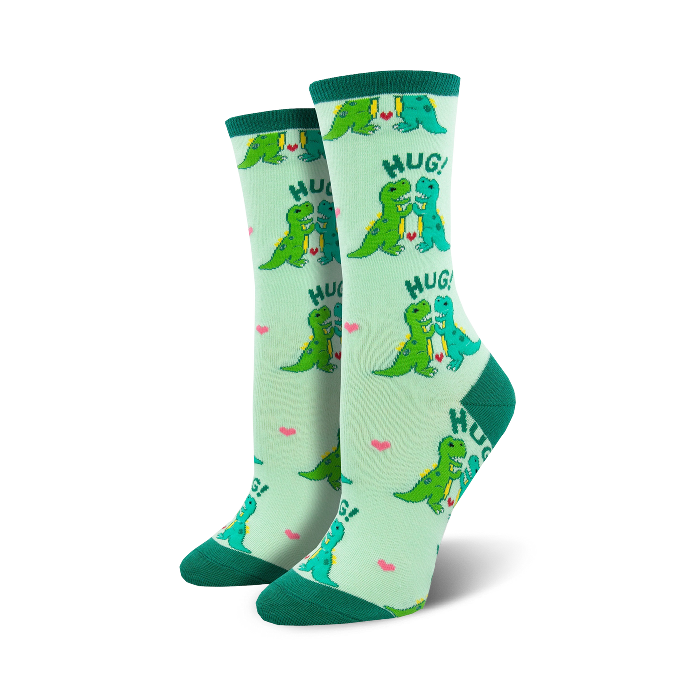Pair of women's crew socks, light green with teal dinosaurs hugging, and pink hearts. Text says 'HUG!'