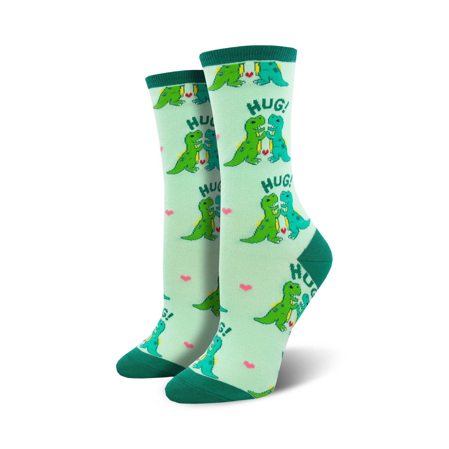 Pair of women's crew socks, light green with teal dinosaurs hugging, and pink hearts. Text says 'HUG!'