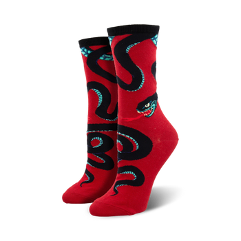 crew length socks with a pattern of black snakes with blue and green details on a red background for women.  