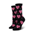 Pair of black crew socks featuring a repeating pattern of pink hearts with 'TRUE CRIME' text and gray fingerprints.