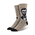 Crew socks in beige and black, featuring a portrait of Abraham Lincoln and text from the Gettysburg Address.