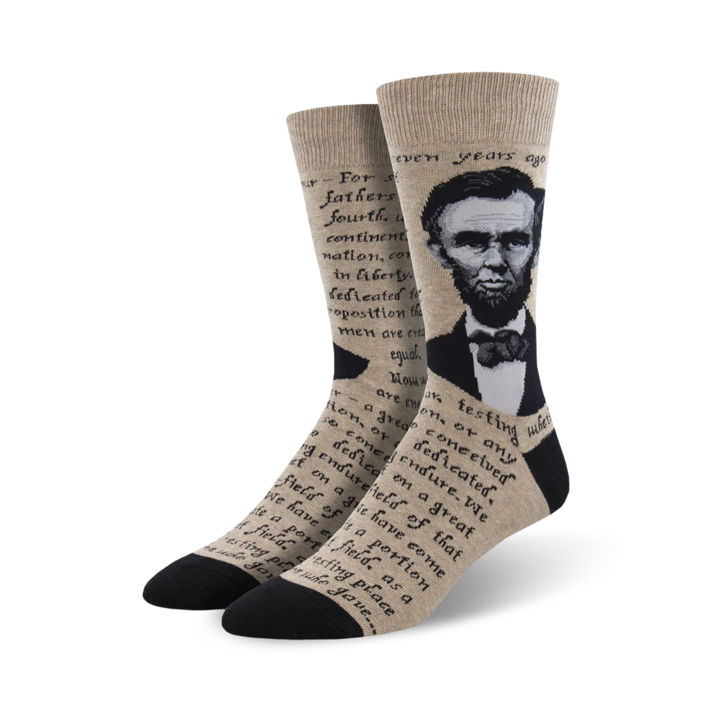 Crew socks in beige and black, featuring a portrait of Abraham Lincoln and text from the Gettysburg Address.