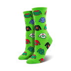 Pair of crew socks in bright green and red, featuring a whimsical all-over print of various holiday-themed ugly sweaters.