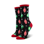 Pair of women's crew socks.  Black and navy background with red and green Christmas ornament designs and snowflakes.