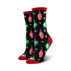 black crew socks with red and green ornament pattern, snowflakes, and red cuff and green toe.  