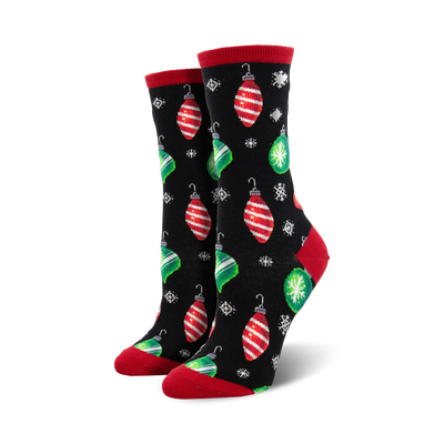 black crew socks with red and green ornament pattern, snowflakes, and red cuff and green toe.  