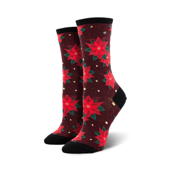dark red crew socks with a pattern of red and green poinsettias with yellow centers.   