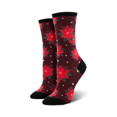 dark red crew socks with a pattern of red and green poinsettias with yellow centers.   