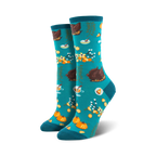 Pair of teal crew socks with a Thanksgiving-themed pattern: roasted turkeys, pumpkins, pie, and fall foliage.