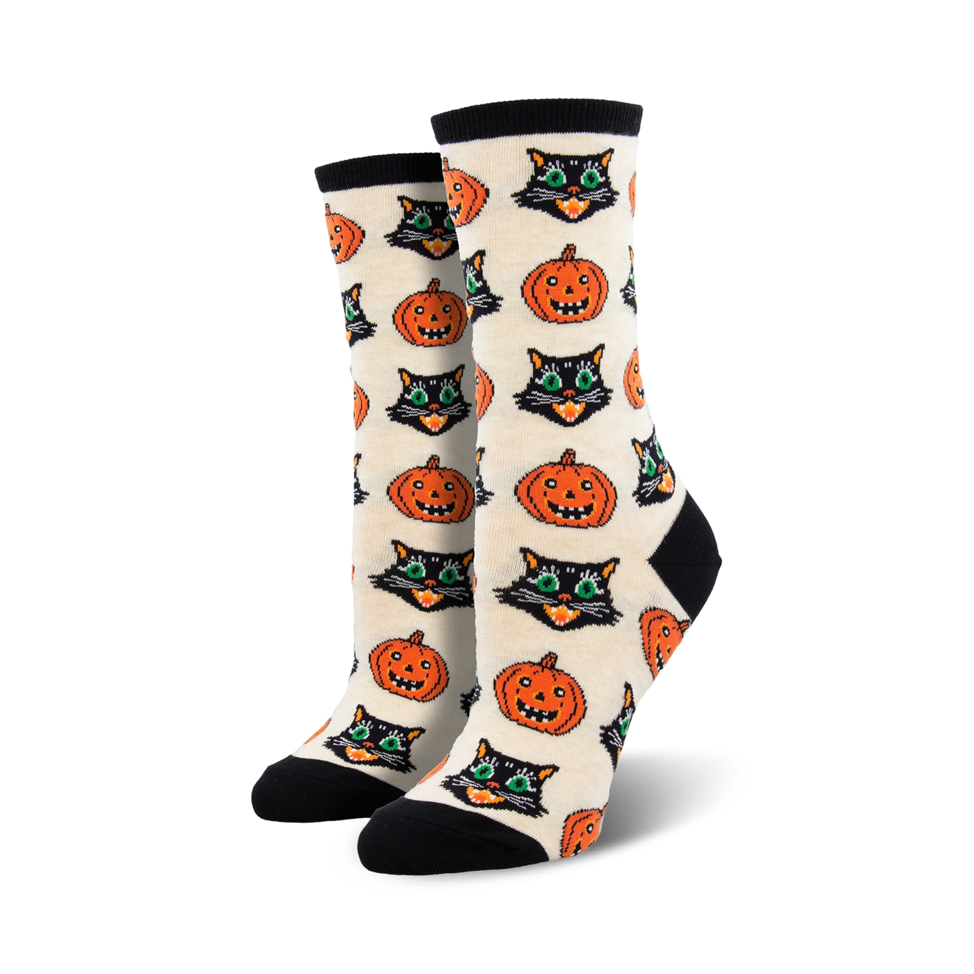 Close-up showing detail of the cream-colored Vintage Halloween socks with black cat and pumpkin design.