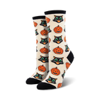 Close-up showing detail of the cream-colored Vintage Halloween socks with black cat and pumpkin design.