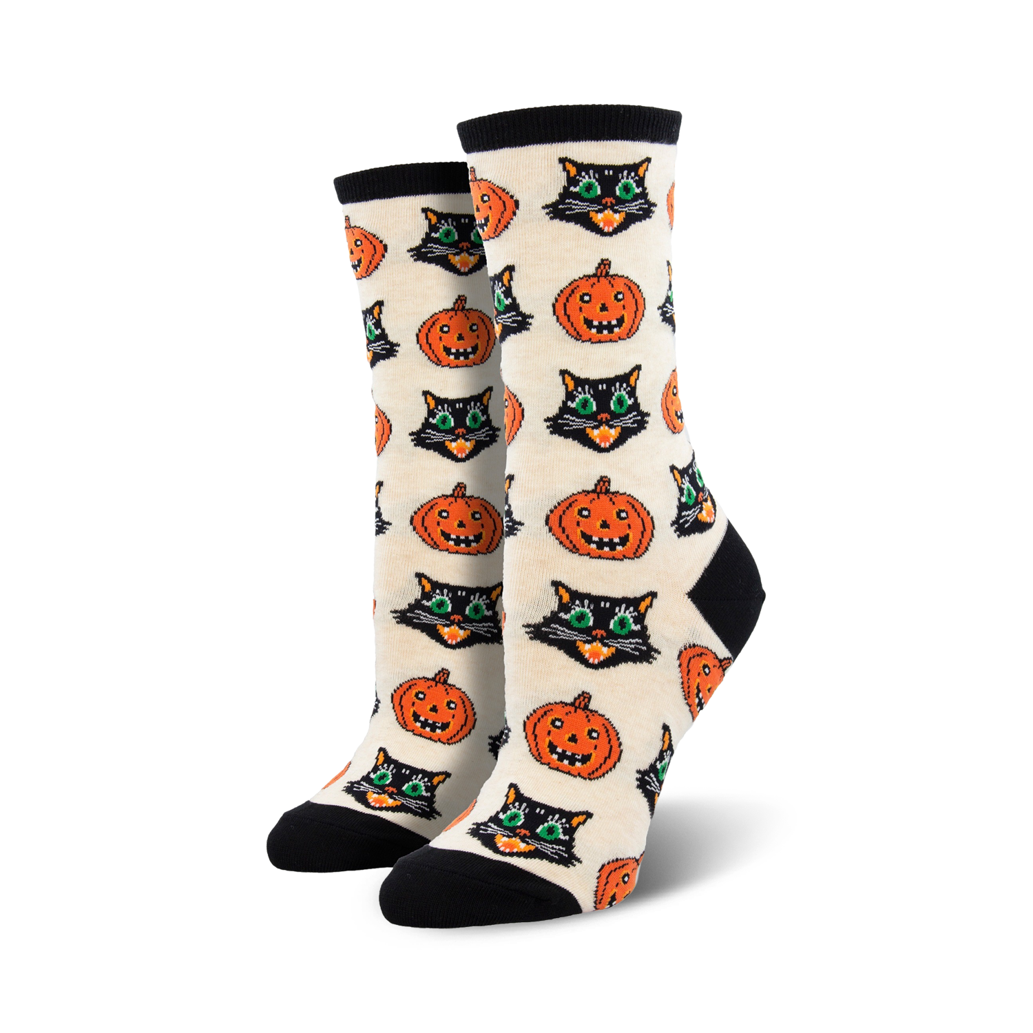 Close-up showing detail of the cream-colored Vintage Halloween socks with black cat and pumpkin design.