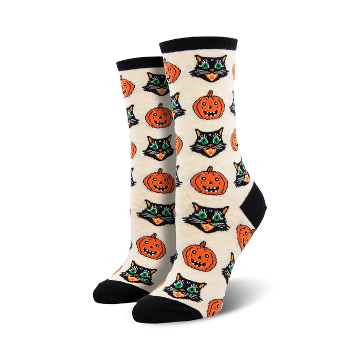 vintage halloween crew socks featuring black cats and pumpkins on a cream background.  