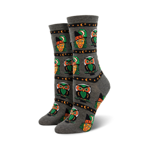 gray owl-patterned crew socks with green hats, moons and stars. womens halloween style.  