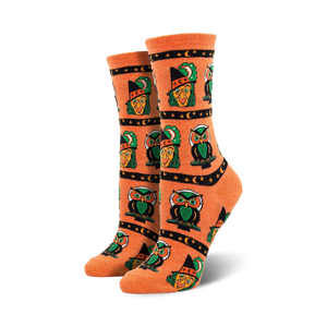 halloween-themed women's crew socks with orange, green, black, and yellow pattern of owls, crescent moon, and witches hats.  