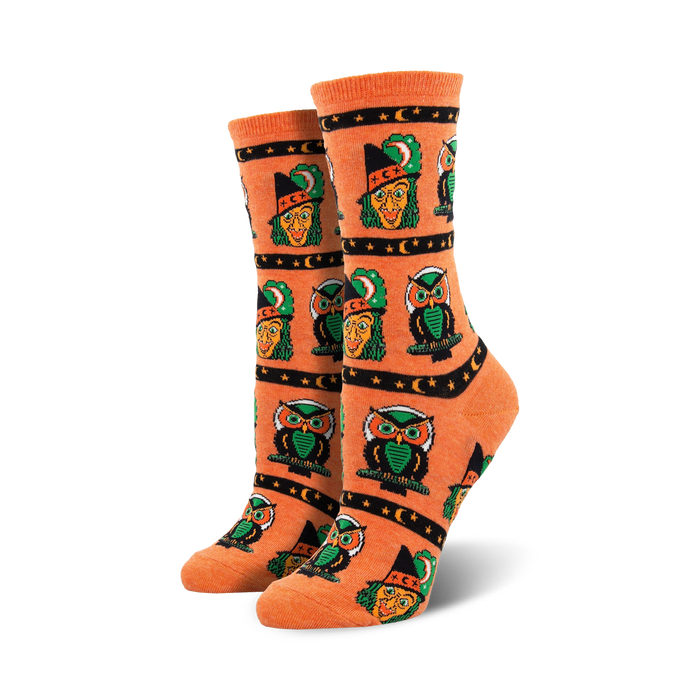 halloween-themed women's crew socks with orange, green, black, and yellow pattern of owls, crescent moon, and witches hats.  