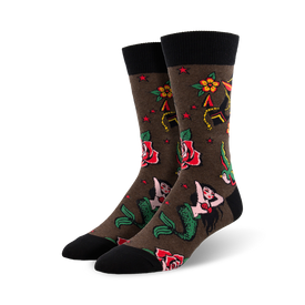crew length cotton socks feature brown background with traditional tattoo designs like mermaids, roses, stars, and swallows.   
